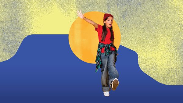 Girl with red beanie and long brown hair kicking up her foot in front of a blue and yellow background